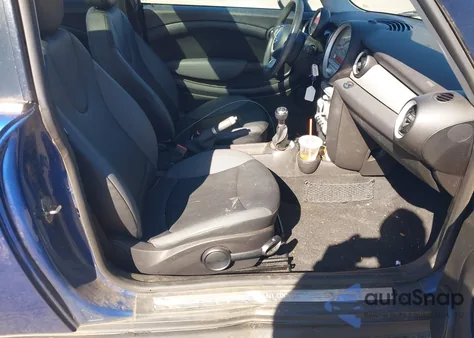 2007 Mini Cooper z USA, uszkodzony, nr VIN WMWMF335X7TU62189